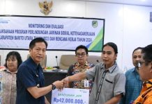 Pj. Bupati Buka Secara Resmi Rapat Monitoring dan Evaluasi Pelaksanaan Jaminan Perlindungan Sosial Ketenagakerjaan