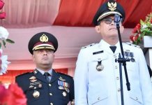 Pj. Bupati Barut Indra Gunawan Bacakan Sambutan Kapolda Kalteng di HUT Ke-79 Bhayangkara.